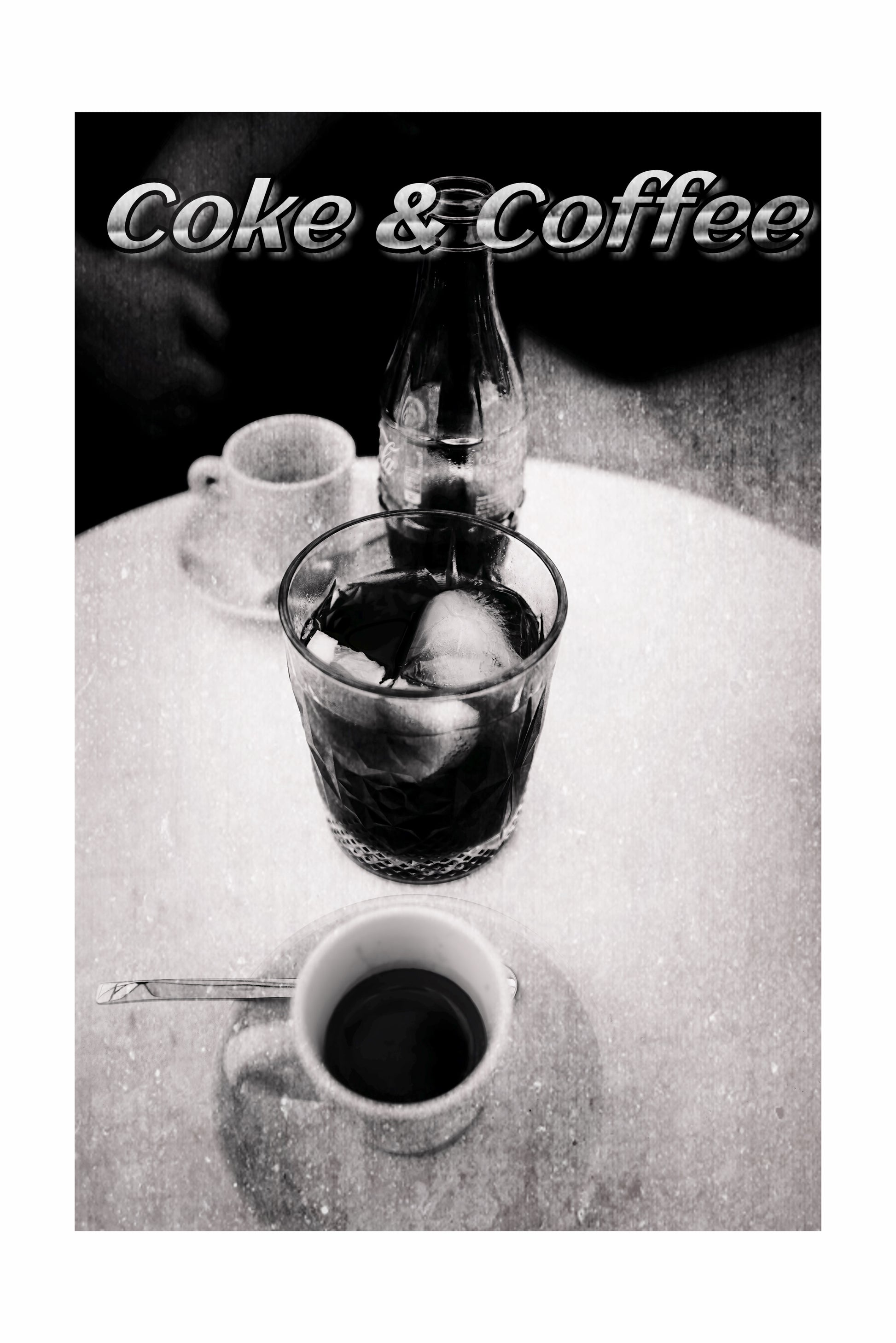 Black and white photo of a bottle, glass, and cup on a table with 'Coke & Coffee' text.
